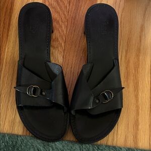 Bass Black Leather Slip-On Mules with Buckle Accent